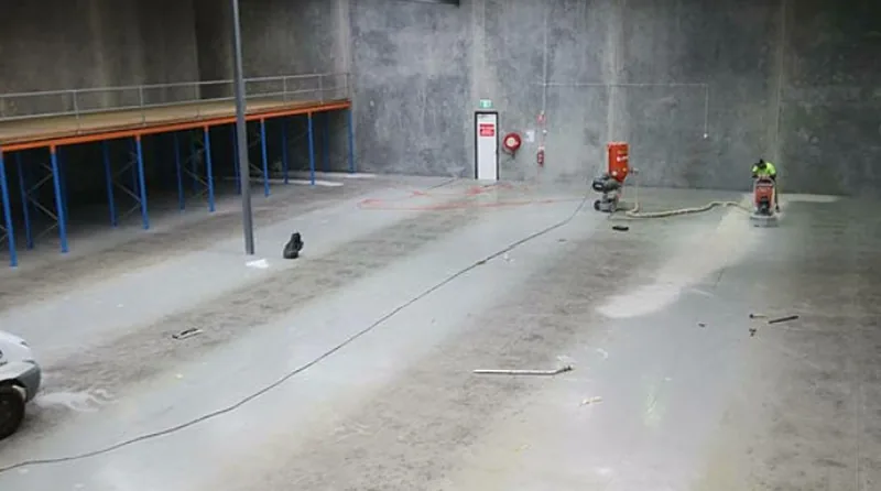 Diamond grinding a metro Atlanta concrete slab before coating