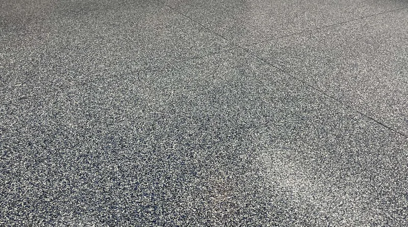 Close-up of a completed flake epoxy floor, metro Atlanta