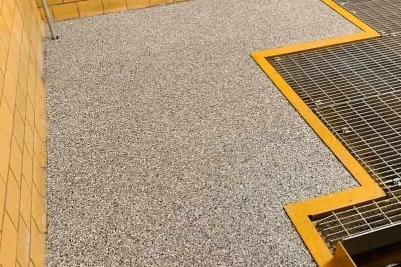 Warehouse epoxy floor with yellow safety markings, metro Atlanta